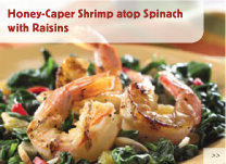 Honey-Caper Shrimp atop Spinach with Raisins